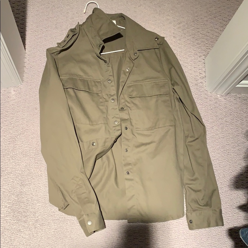 Army green button down jacket. Never worn